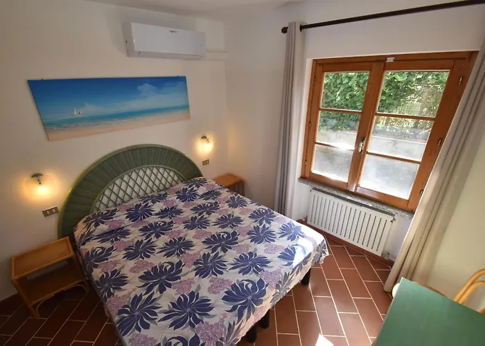 Mimosa - Aria Condizionata, Giardino, Biciclette E Posti Auto Coperti Lejlighed Marina di Campo